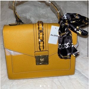 Mustard Aldo purse.